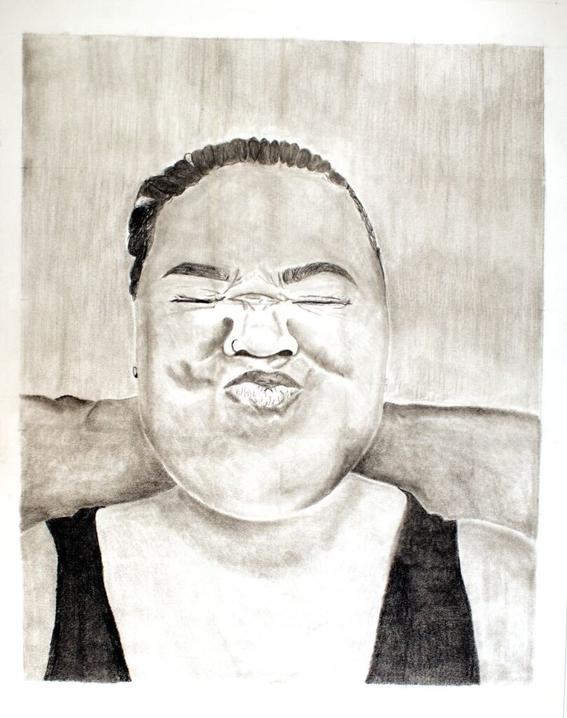 Self portrait drawn in graphite